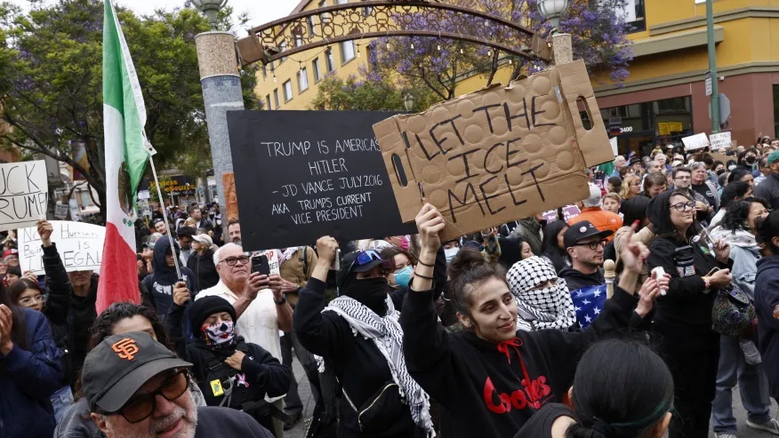 Protests over immigration raids pop up across the US with more planned
