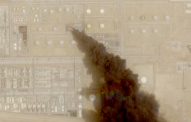 A satellite image shows trail of smoke rising from an oil facility, in Jizan, Jazan province, Saudi Arabia, July 26, 2026. Yemen's Iran-aligned Houthis said on Saturday, July 25, that they carried out operations targeting Saudi Aramco facilities in Jizan and Yanbu, according to a statement by the group's military spokesperson Yahya Sare. European Union/Copernicus Sentinel-2/Handout via REUTERS