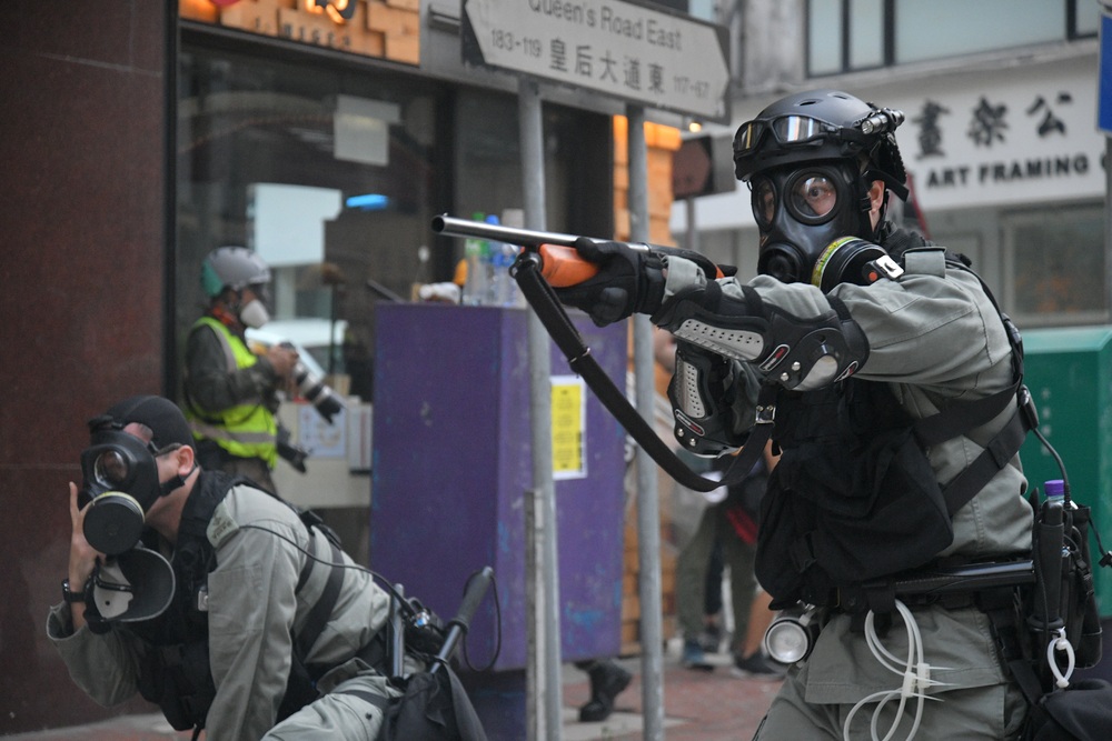 Anti-riot police dispersing protesters in Causeway Bay on National Day, October 1, 2019. File photo. Anti-riot police dispersing protesters in Causeway Bay on National Day, October 1, 2019. File photo.