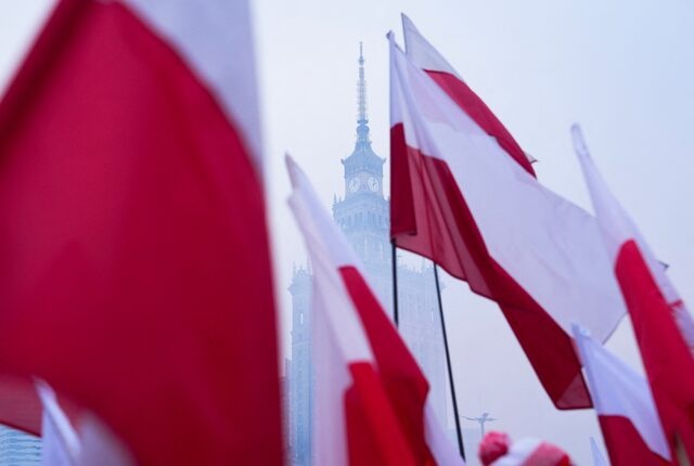 Polish flags flutter near the Palace of Culture and Science in Warsaw, Poland November 11, 2024. REUTERS/Aleksandra Szmigiel/File Photo