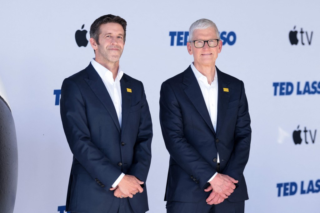 Apple's John Ternus and Tim Cook. (Photo by VALERIE MACON / AFP)