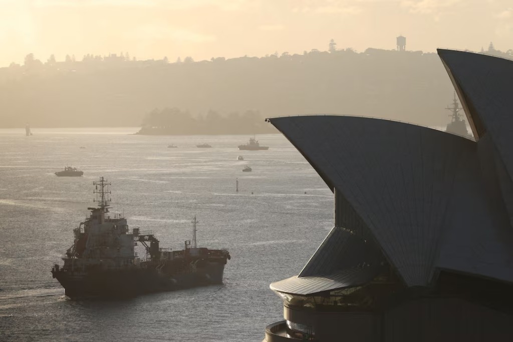  An oil products tanker passes the Sydney Opera House at sunrise in Sydney, Australia, March 21, 2026. REUTERS/Hollie Adams/File Photo