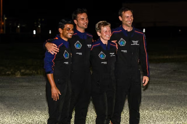 The Axiom-4 crew, Pilot Shubhanshu Shukla of India, Mission Specialist Tibor Kapu of Hungary, Commander Peggy Whitson of the U.S., and Mission Specialist Slawosz Uznanski-Wisniewski of Poland, react as they greet their family members before their mission to the International Space Station, in Cape Canaveral, Florida, U.S., June 24, 2025. REUTERS/Steve Nesius/File Photo 