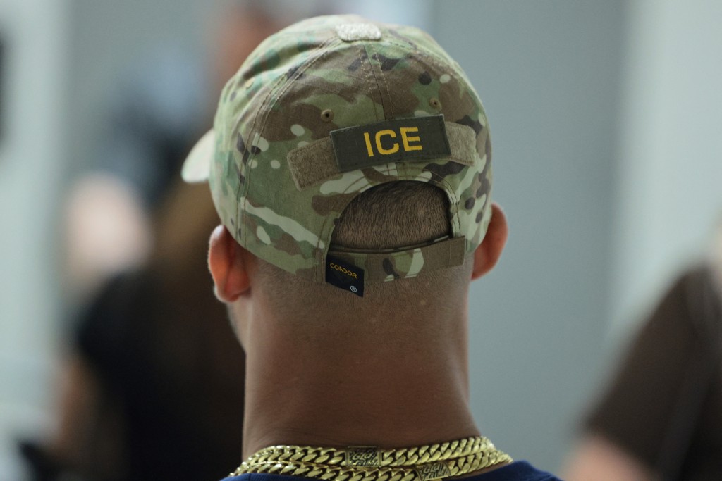 Photo by MICHAEL M. SANTIAGO / GETTY IMAGES NORTH AMERICA / GETTY IMAGES VIA AFP  Immigration and Customs Enforcement (ICE) agents patrol the halls of immigration court at the Jacob K. Javits Federal Building on June 24, 2026 in New York City. 