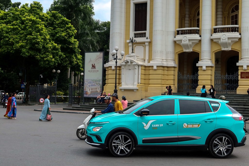 A VinFast electric taxi operated by Vietnam-based fleet operator Green SM is pictured in Hanoi, Vietnam, October 10, 2023. REUTERS/Thinh Nguyen