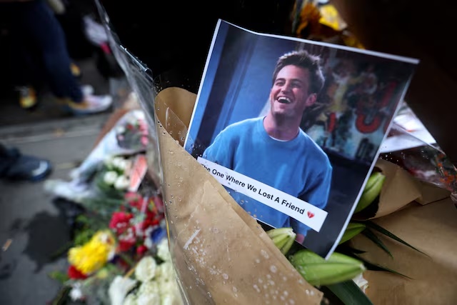 A makeshift memorial for actor Matthew Perry, the wise-cracking co-star of the 1990s hit television sitcom "Friends," who was found dead at his Los Angeles home October 28, is pictured on Bedford Street in Manhattan in New York City, U.S., October 30, 2023. REUTERS/Mike Segar/File Photo