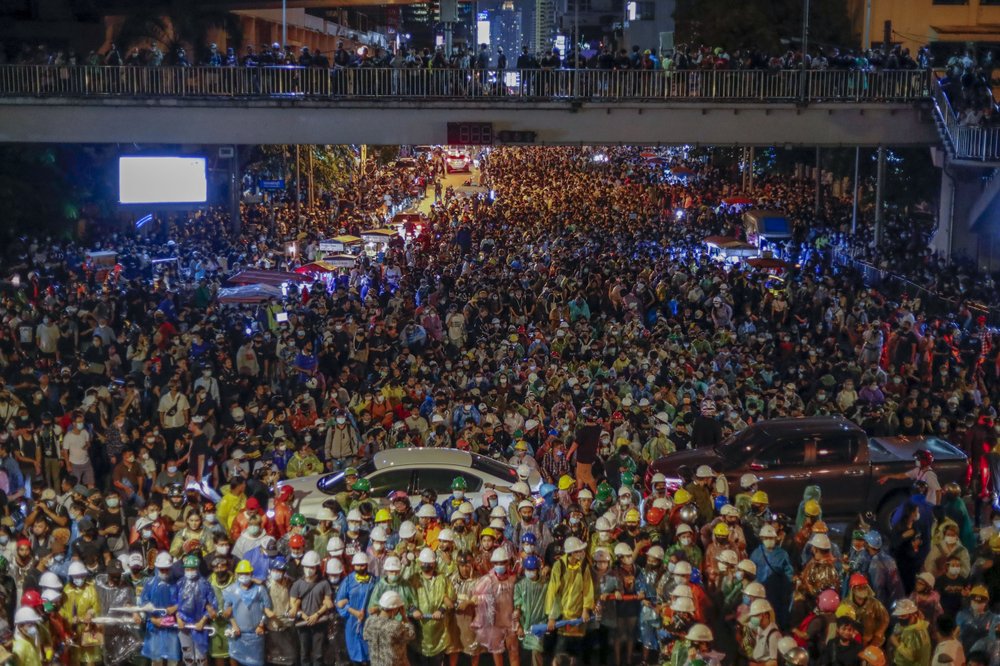 Pro-democracy activists march to the Government House, prime minister's office during a protest march in Bangkok, Thailand, Wednesday. Pro-democracy activists march to the Government House, prime minister's office during a protest march in Bangkok, Thailand, Wednesday.