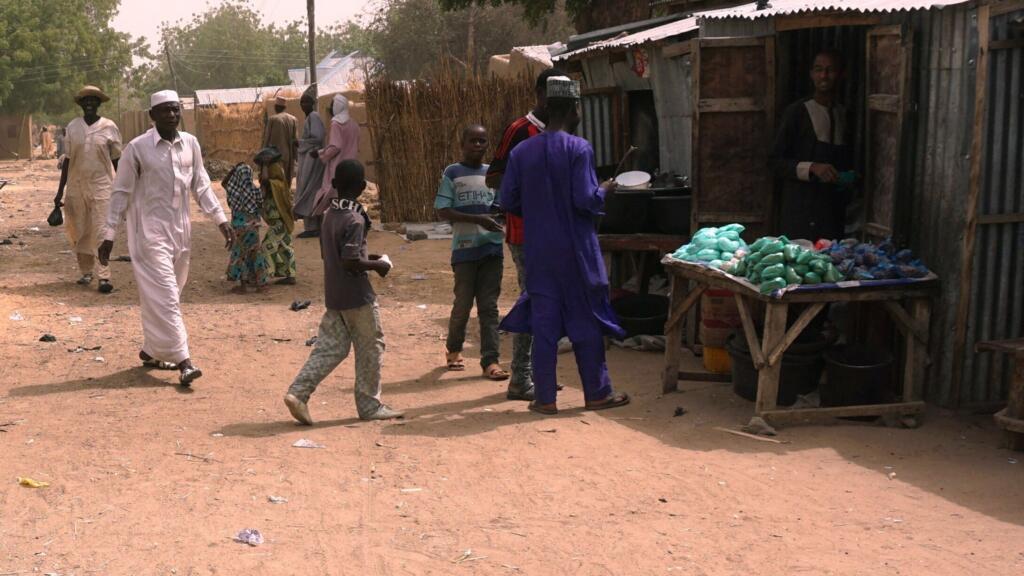 File photo: Residents walk along a street in Dapchi, Nigeria, on February 22, 2018. © Aminu Abubakar, AFP