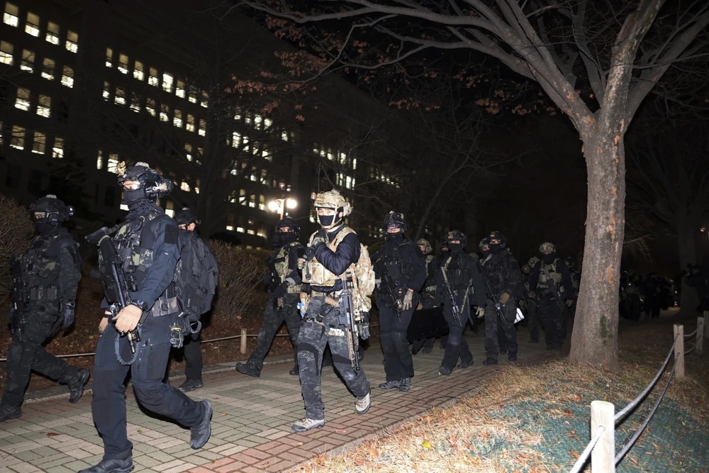 South Korean martial law soldiers leave the National Assembly in Seoul, South Korea, Wednesday, Dec. 4, 2024. (AP)