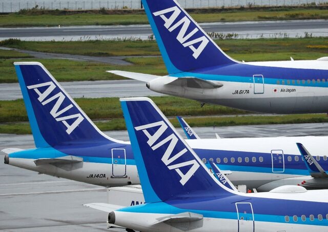 All Nippon Airways (ANA) aircraft are seen amid the coronavirus disease (COVID-19) outbreak at the Tokyo International Airport, commonly known as Haneda Airport in Tokyo, Japan October 23, 2020. REUTERS/Issei Kato/File Photo