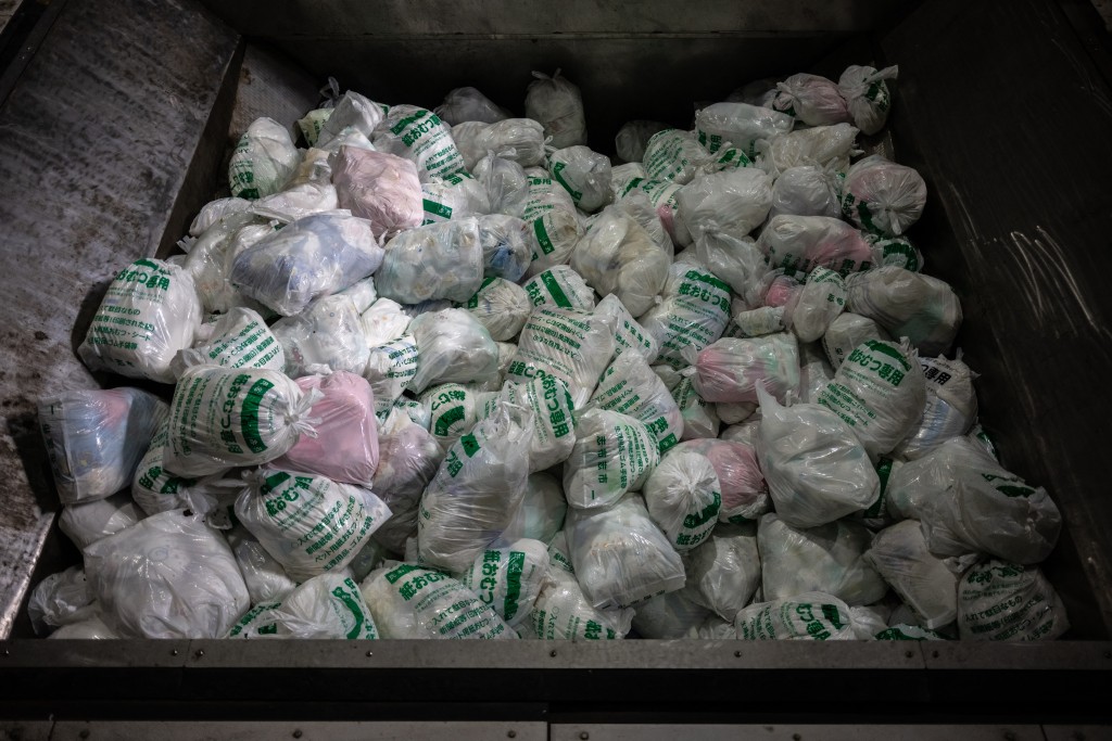 Photo by PHILIP FONG / AFP  This picture taken on January 15, 2026 shows recycled diapers in a recycling facility in Osaki town, Kagoshima Prefecture.