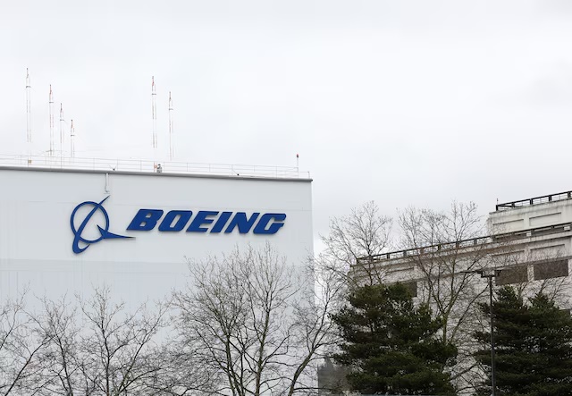 The Boeing building is seen next to Boeing Field in Seattle, Washington, U.S., March 26, 2018. REUTERS/Lindsey Wasson/ File Photo