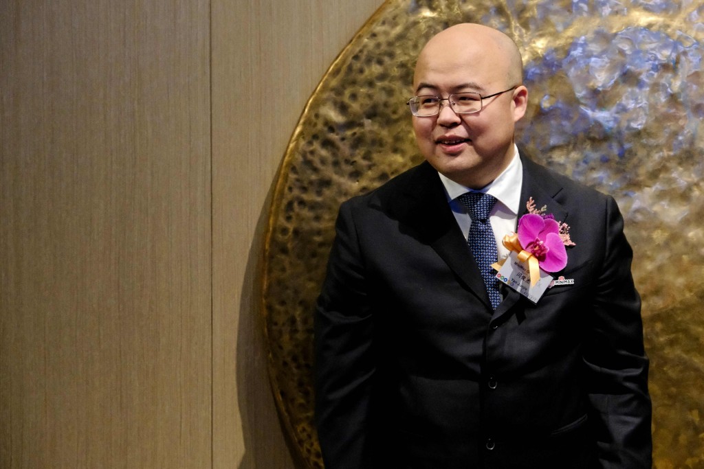 Shanghai-based AI startup MiniMax's CEO Yan Junjie, a former executive at the Chinese leading AI software company SenseTime which was blacklisted by the US Commerce Department in 2021, attends the company's listing ceremony at the Hong Kong stock exchange on January 9, 2026. AFP