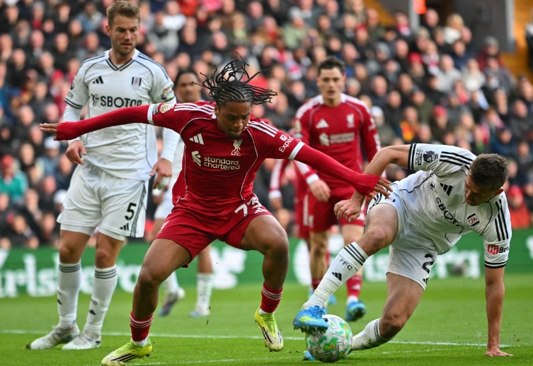 Rio Ngumoha, left, vies with Fulham defender Timothy Castagne during the match at Anfield. AFP