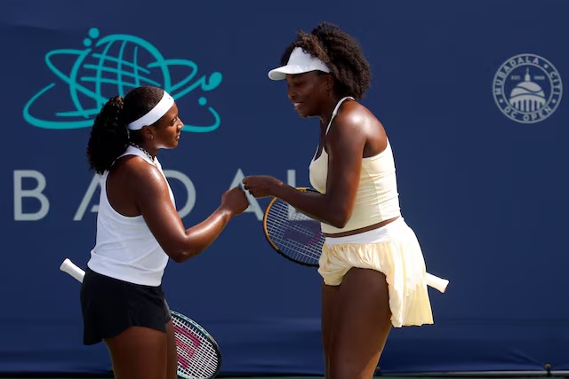 Jul 21, 2025; Washington, D.C., USA; Venus Williams (USA)(R) and Hailey Baptiste (USA)(R) celebrate after winning a point against Eugenie Bouchard (CAN) and Clervie Ngounoue (USA) (both not pictured) in a women's doubles match on day one of the Mubadala Citi DC Open at Rock Creek Park Tennis Center. Mandatory Credit: Geoff Burke-Imagn Images/File Photo