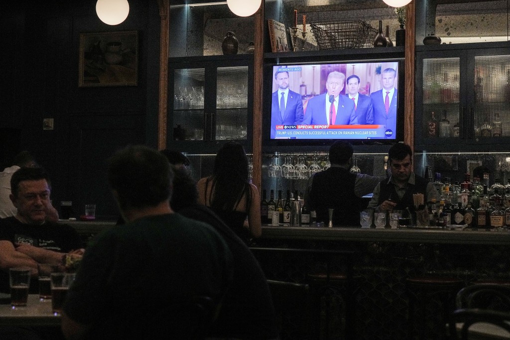 A television screem displays news after the address to the nation by U.S. President Donald Trump in which he said that a "very successful attack" on three nuclear sites had been carried out in Iran, in Washington, D.C., U.S., June 21, 2025. (Reuters)