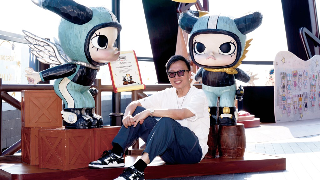 Local artist and designer Kenny Wong with MOLLY, his iconic creation and “daughter”. Local artist and designer Kenny Wong with MOLLY, his iconic creation and “daughter”.