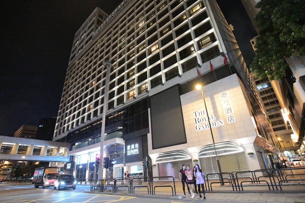 Three staff from the Royal Garden Hotel were infected with the coronavirus, pushing the hotel cluster's tally to four. Three staff from the Royal Garden Hotel were infected with the coronavirus, pushing the hotel cluster's tally to four.