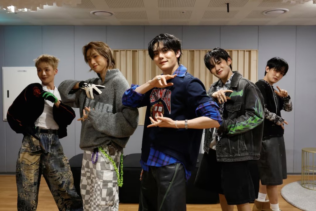 Members of K-pop boy band 1VERSE, including Hyuk and Seok who defected from North Korea, as well as Aito, Nathan and Kenny, perform their new single in front of a camera in Seoul, South Korea, May 21, 2025. REUTERS/Kim Soo-hyeon