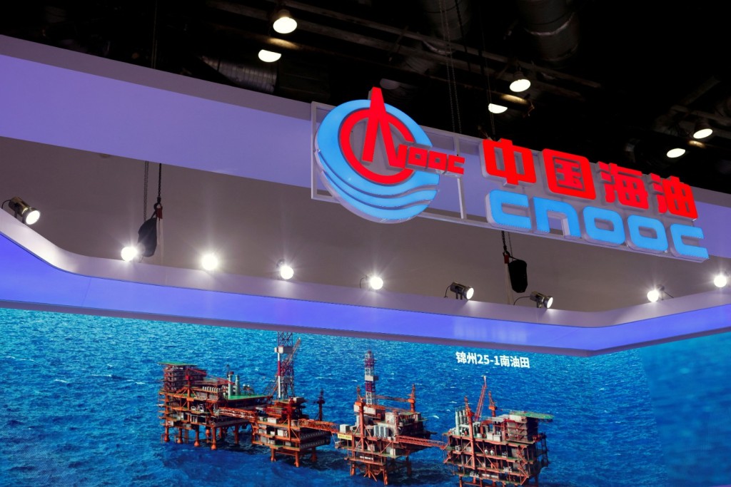 A screen displays image of Jinzhou 25-1 oilfield at a China National Offshore Oil Corporation (CNOOC) booth. Reuters