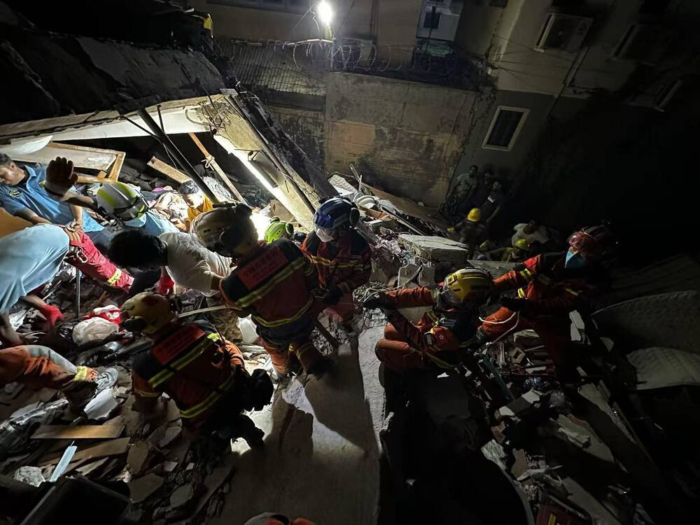 Hong Kong search and rescue team members conducted overnight operations after arriving in Mandalay on Monday. (Security Bureau)