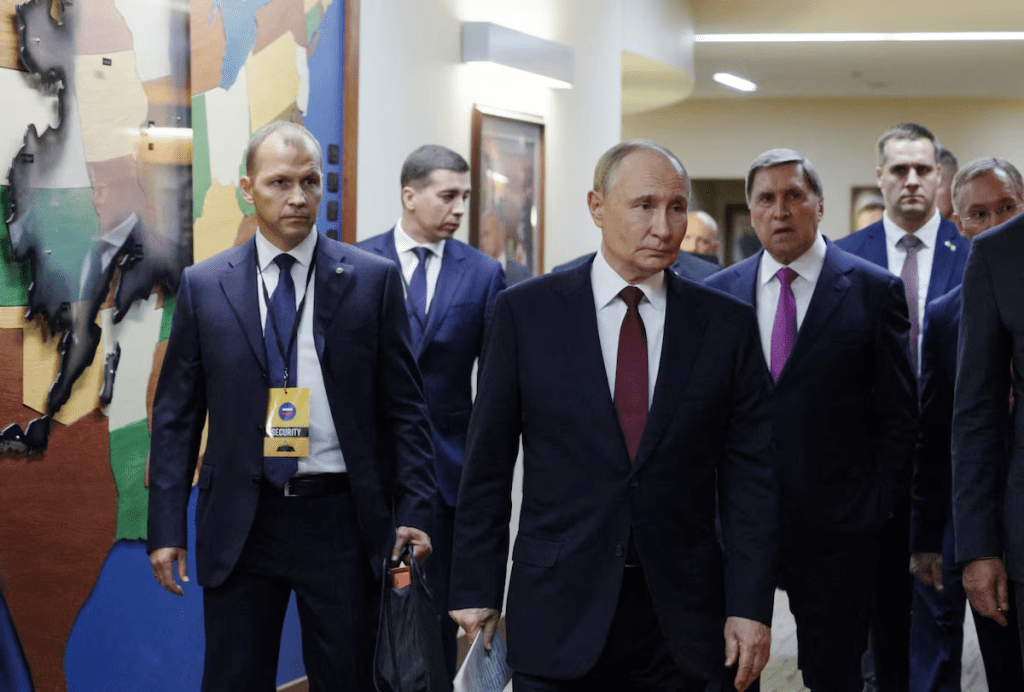 Russian President Vladimir Putin walks after a meeting with U.S. President Donald Trump at Joint Base Elmendorf-Richardson in Anchorage, Alaska, U.S., August 15, 2025. Sputnik/Gavriil Grigorov/Pool via REUTERS