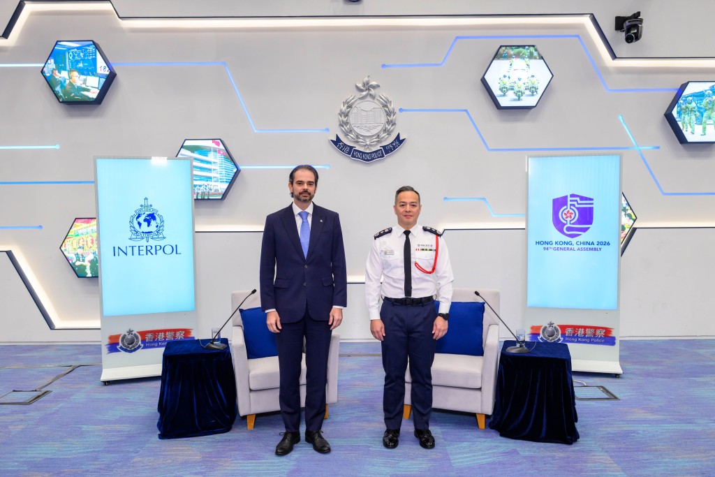 INTERPOL Secretary-General Valdecy Urquiza(right) and Hong Kong Police Commissioner Joe Chow Yat-ming