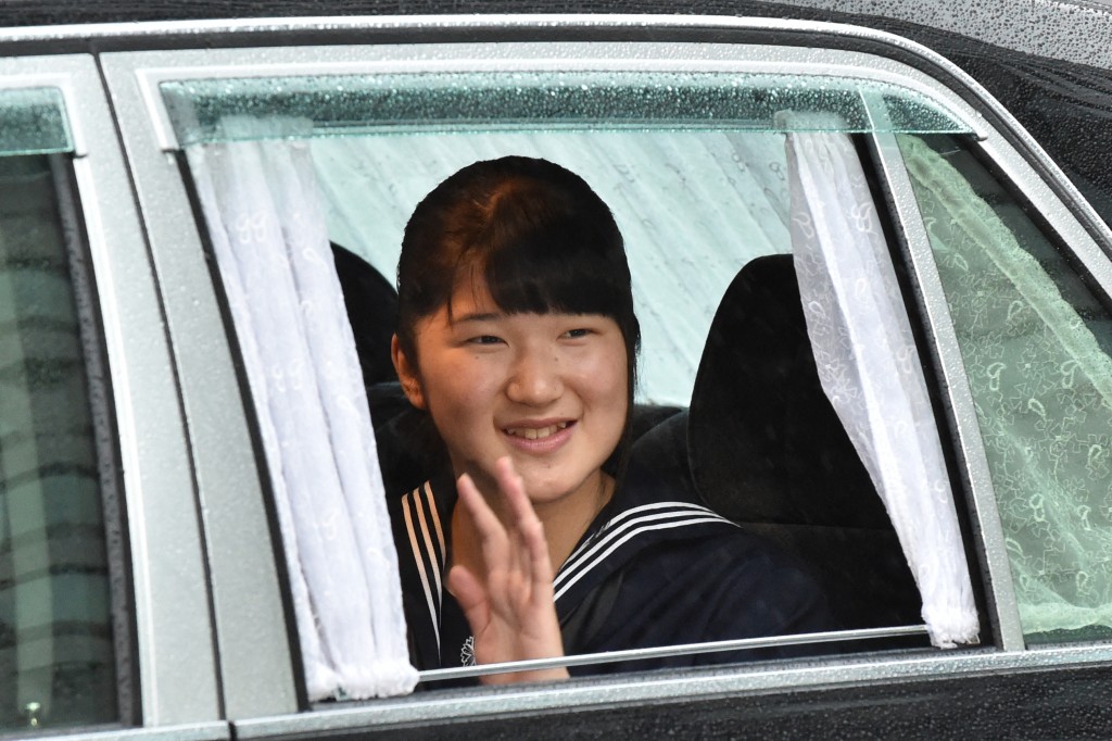 Photo by KAZUHIRO NOGI / AFP  A vehicle carrying Princess Aiko, the only child of Crown Prince Naruhito and Crown Princess Masako, arrives at the Imperial Palace in Tokyo on April 30, 2019.