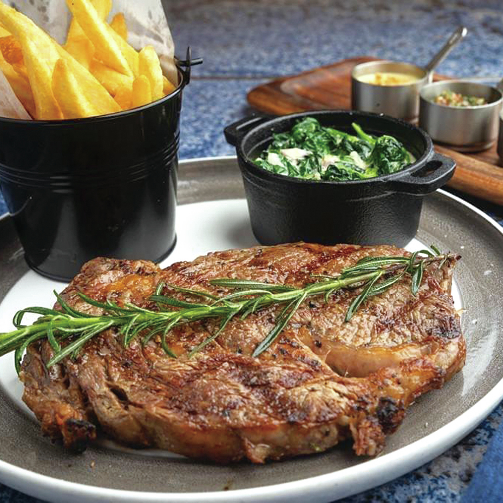 Flying Pig Bistro''s signature Rib Eye Steak  