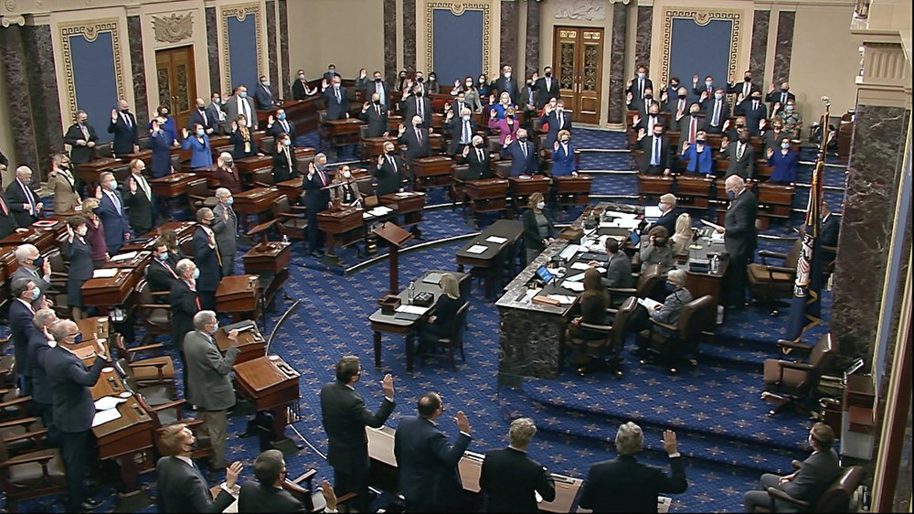 Vermont Senator Patrick Leahy, the president pro tempore of the Senate, who is presiding over the impeachment trial of former President Donald Trump, swears in members of the Senate for the impeachment trial at the U.S. Capitol in Washington, Tuesday, January 26, 2021. Vermont Senator Patrick Leahy, the president pro tempore of the Senate, who is presiding over the impeachment trial of former President Donald Trump, swears in members of the Senate for the impeachment trial at the U.S. Capitol in Washington, Tuesday, January 26, 2021.