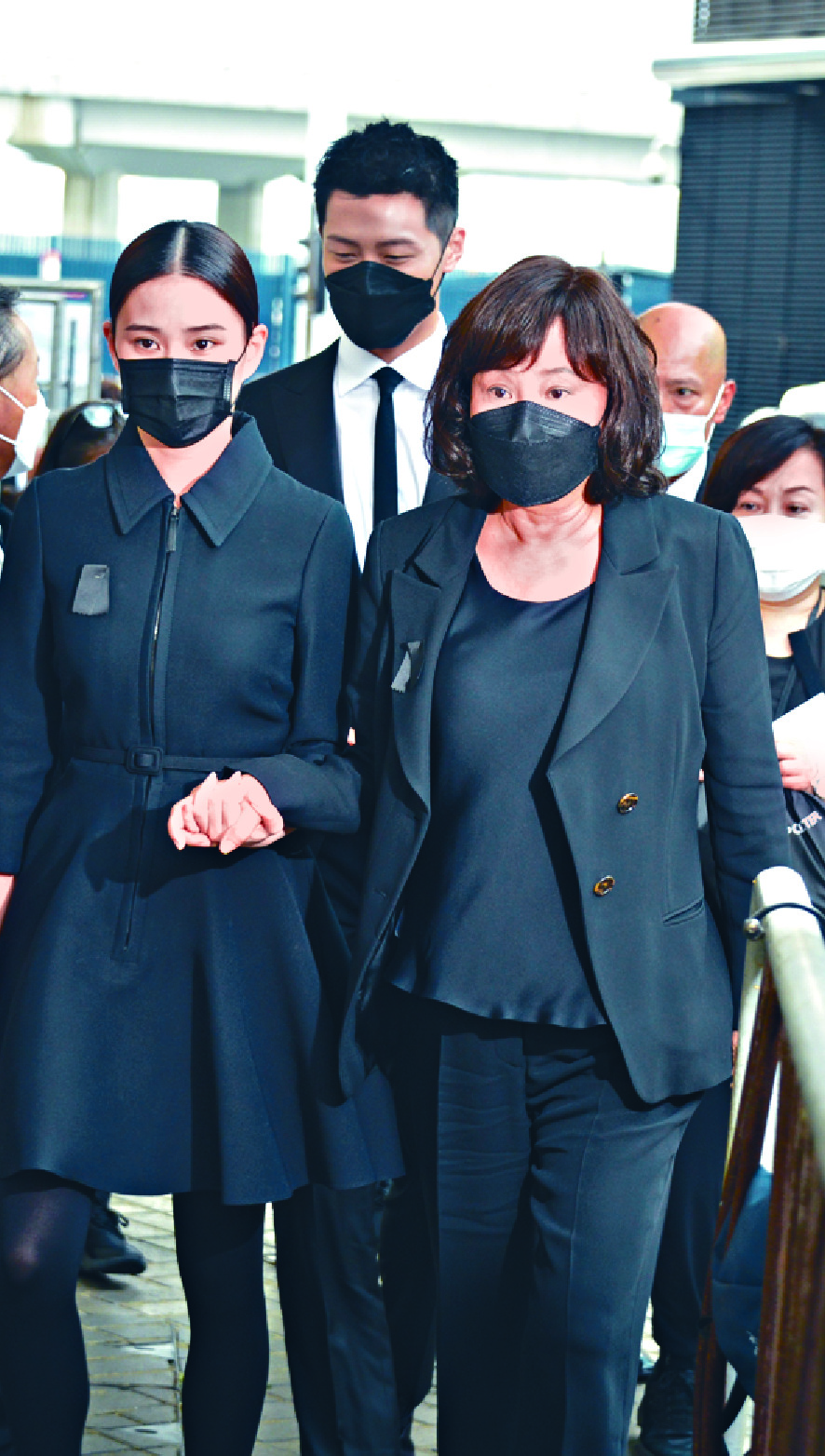 Arriving at the vigil for Stanley Ho are, from far left, his son Lawrence and wife Sharon Lo; daughter Pansy Ho; and wife Ina Chan and their daughter Laurinda Ho. Arriving at the vigil for Stanley Ho are, from far left, his son Lawrence and wife Sharon Lo; daughter Pansy Ho; and wife Ina Chan and their daughter Laurinda Ho.