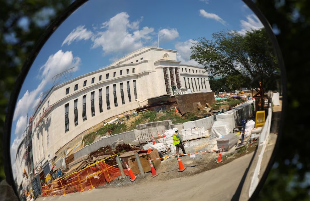  The Federal Reserve headquarters, where construction continues, is reflected in a mirror in Washington, D.C., U.S., August 6, 2026. REUTERS/Kevin Lamarque 