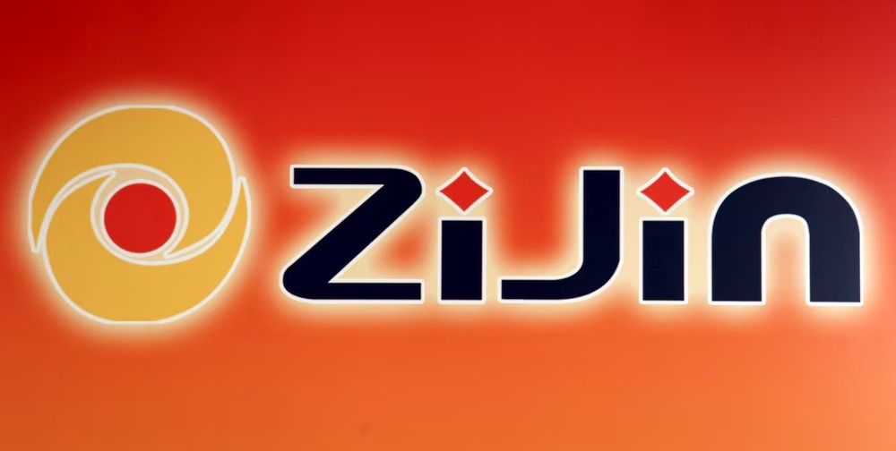 The company logo of Zijin Mining Group Co Ltd, China's biggest listed gold producer, is displayed at a news conference following its annual results in Hong Kong, China March 29, 2016. REUTERS