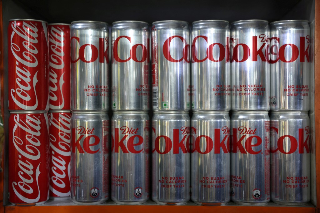 Coca-Cola Diet Coke cans on display for sale inside a shop in New Delhi, India, April 22, 2026. REUTERS