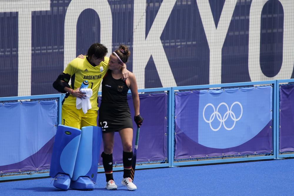  In this Aug. 2, 2021, file photo, Argentina goalkeeper Maria Belen Succi (1) comforts Germany's Charlotte Stapenhorst, right, after Argentina won their women's field hockey match at the 2020 Summer Olympics, in Tokyo, Japan.