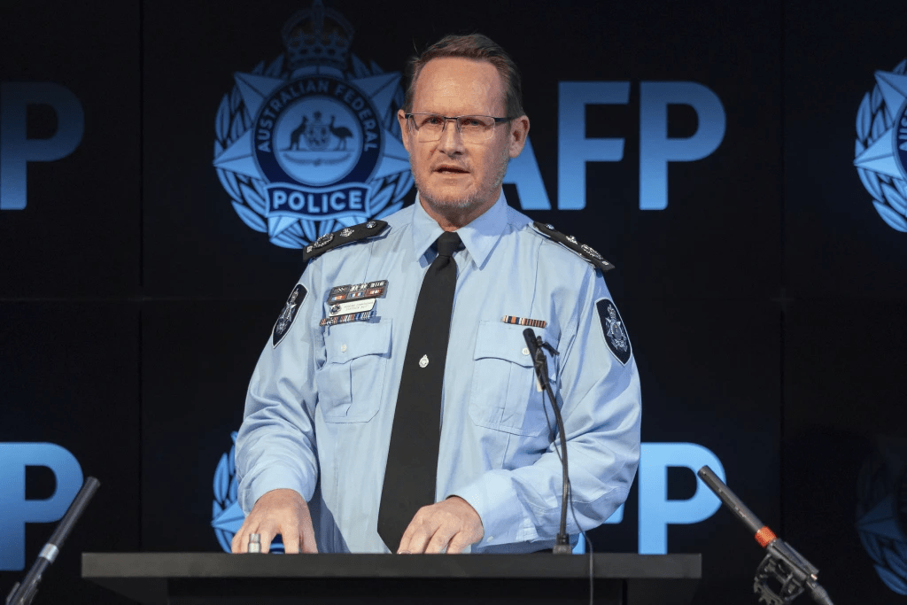 In this photo provided by the Australian Federal Police, Assistant Commissioner for Counterterrorism and Special Investigations Stephen Nutt speaks in Canberra, on Monday, Aug. 4, 2025, about a Chinese national being charged under Australia’s foreign interference laws. (Australian Federal Police via AP)