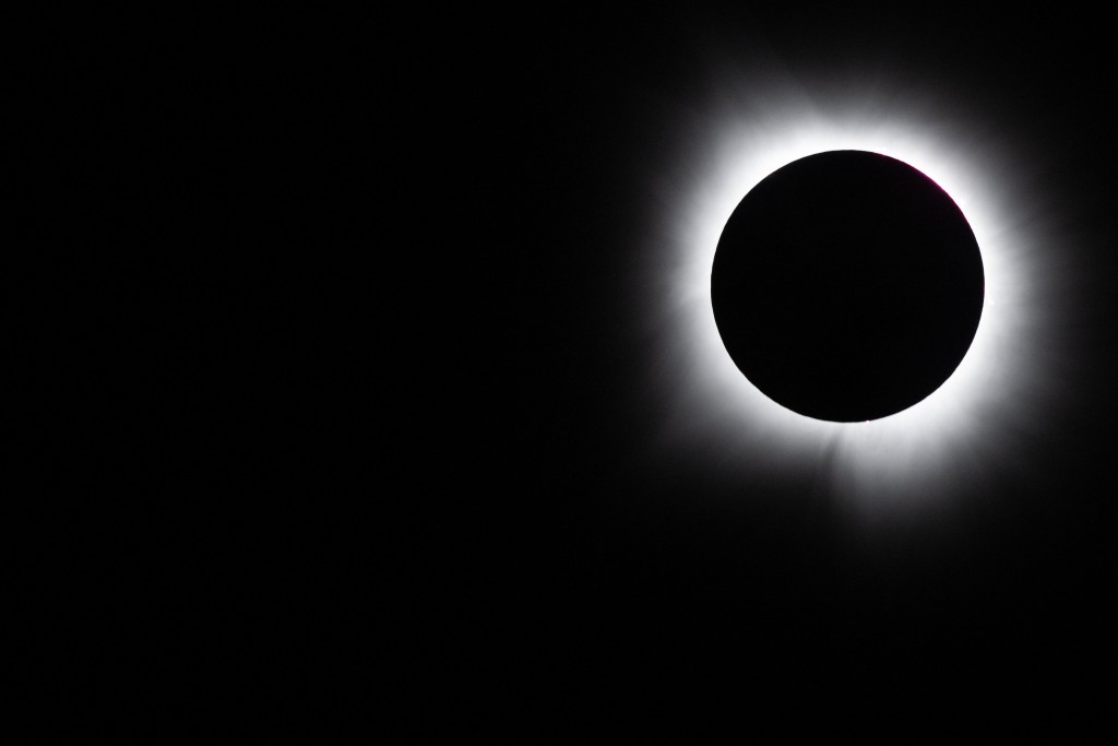Photo by BRANDON BELL / GETTY IMAGES NORTH AMERICA / AFP  The moon fully passes over the sun's horizon during a Total solar eclipse on April 08, 2024 in Brady, Texas.