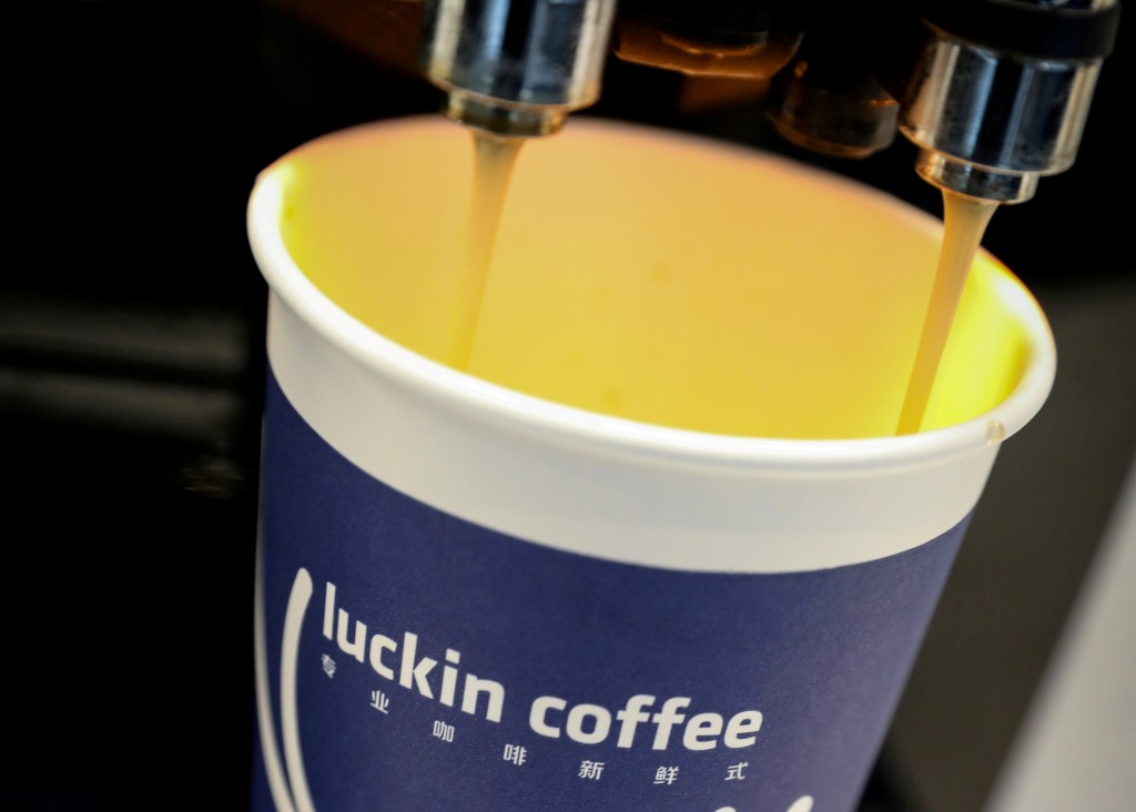 A cup of coffee is poured during Luckin Coffee's IPO at the Nasdaq Market site in New York, US, May 17, 2019. REUTERS