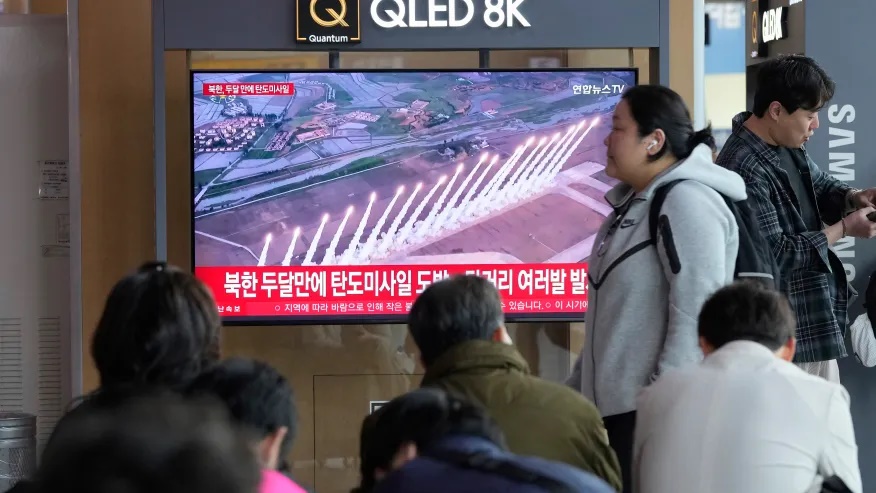 A TV screen shows a file image of North Korea’s missiles launch during a news program at Seoul Railway Station in Seoul, South Korea, Thursday, May 8, 2025. (AP Photo/Ahn Young-joon)