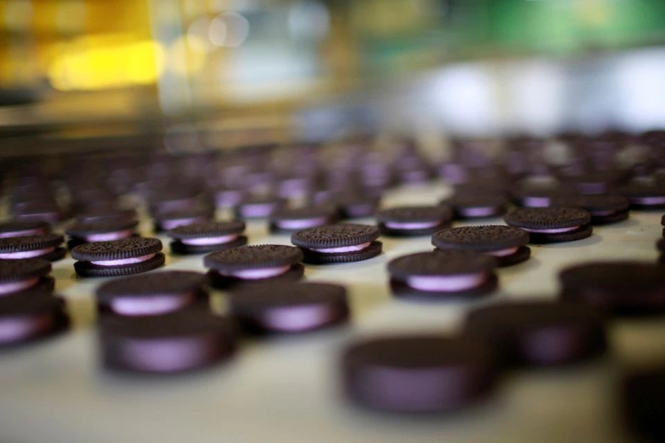 Freshly baked Oreo cookies pass along a conveyor belt at a Kraft Foods' factory in Suzhou, Jiangsu province, China. (Reuters) Freshly baked Oreo cookies pass along a conveyor belt at a Kraft Foods' factory in Suzhou, Jiangsu province, China. (Reuters)