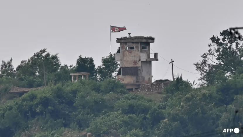A North Korean guard post on the North side of the Demilitarised Zone (DMZ) dividing the two Koreas, is seen from the border city of Paju on Jun 21, 2024. (Photo: AFP/Jung Yeon-je) A North Korean guard post on the North side of the Demilitarised Zone (DMZ) dividing the two Koreas, is seen from the border city of Paju on Jun 21, 2024. (Photo: AFP/Jung Yeon-je)