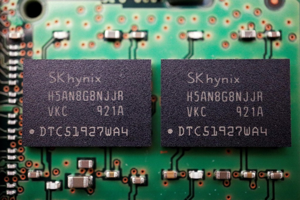Memory chips by South Korean semiconductor supplier SK Hynix are seen on a circuit board of a computer in this illustration picture taken February 25, 2022. REUTERS