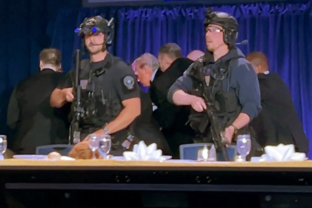 U.S. President Donald Trump is escorted out after a man opened fire with a shotgun on security personnel outside the room, during the annual White House Correspondents' Association dinner in Washington, D.C., U.S., April 25, 2026. (Reuters)