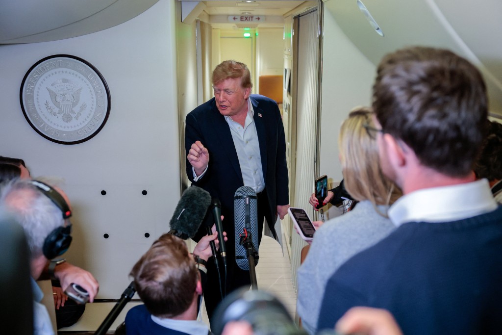 U.S. President Donald Trump speaks to members of the media aboard Air Force One, en route to Joint Base Andrews, Maryland, U.S., following a two-day visit to Ireland, September 13, 2026. (Reuters)