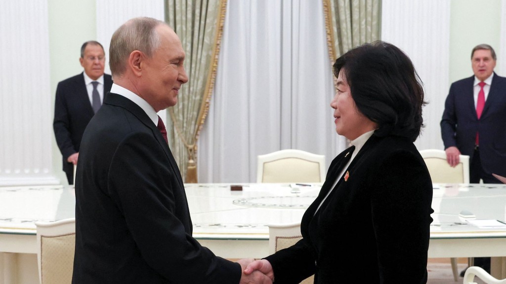 Russian President Putin shakes hands with North Korean Foreign Minister Choe Son Hui during a meeting in Moscow. (Reuters)