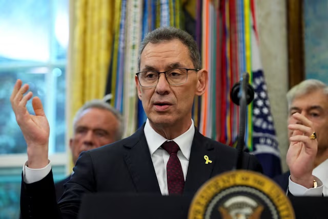 Pfizer CEO Albert Bourla speaks on the day U.S. President Donald Trump announces a deal with Pfizer to sell drugs at lower prices, in the Oval office of the White House in Washington, D.C., U.S., September 30, 2025. REUTERS/Ken Cedeno