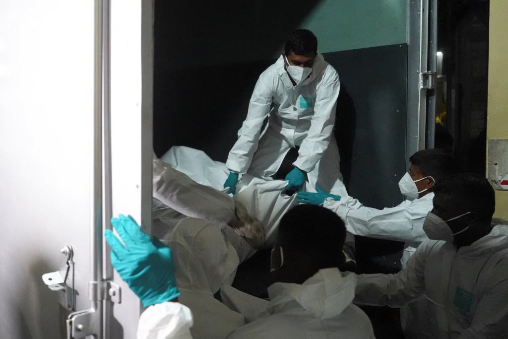 Bodies of Iranian sailors are taken out of a van and moved to the mortuary at Karapitiya Hospital after a submarine attack on the Iranian military ship Iris Dena off Sri Lanka, in Galle, Sri Lanka, March 4, 2026. (Reuters)