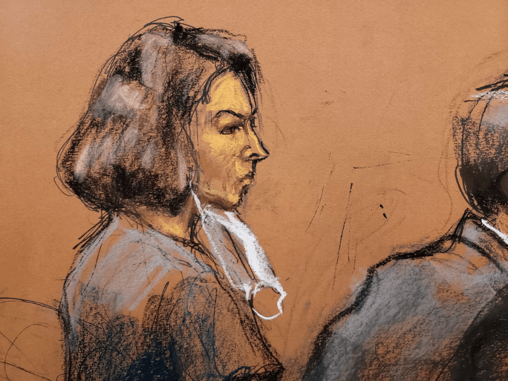 Jeffrey Epstein associate Ghislaine Maxwell sits at the defense table as juror number 50 answers questions from Judge Alison Nathan about his answers on the juror questionnaire in a courtroom sketch in New York City, U.S., March 8, 2022. REUTERS/Jane Rosenberg/File Photo