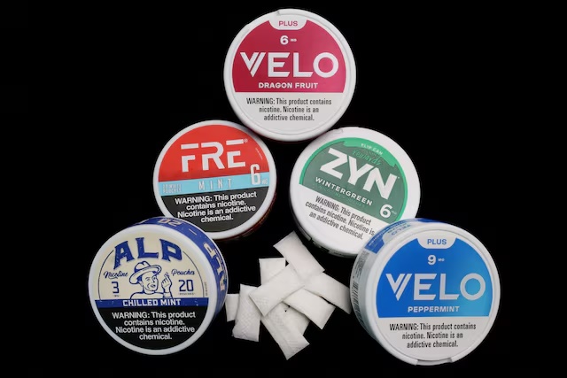 Packages of Velo, Fre, Alp and Zyn nicotine pouches in a photo illustration in New York City, U.S., March 27, 2026. REUTERS/Mike Segar/File Photo