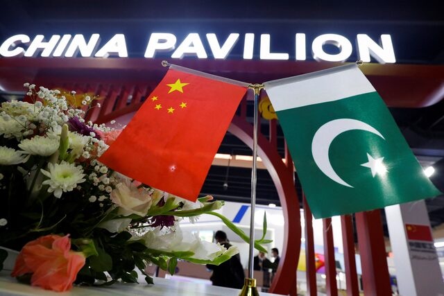 Flags of Pakistan and China are seen at the entrance of the China Pavilion, during the International Defence Exhibition and Seminar "IDEAS 2022" in Karachi, Pakistan November 16, 2022. REUTERS/Akhtar Soomro